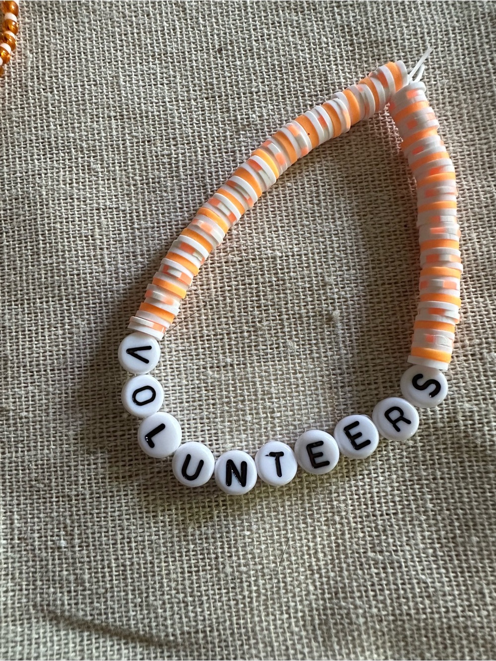 Volunteer womens Beaded Bracelet - White & Orange